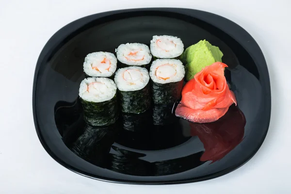 Sushi com caranguejo em uma chapa . — Fotografia de Stock
