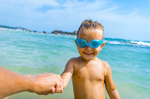 Playful boy in swimming goggles — Stock Photo, Image