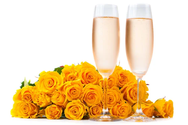 Champagne and a large bouquet of roses — Stock Photo, Image