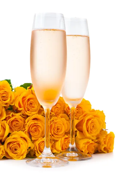 Champagne and a large bouquet of roses — Stock Photo, Image