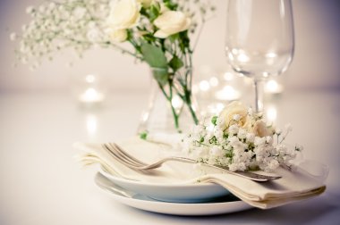 table setting with roses in bright colors and vintage crockery clipart