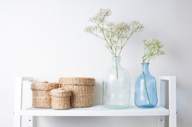 interior decoration: branches in bottles and baskets