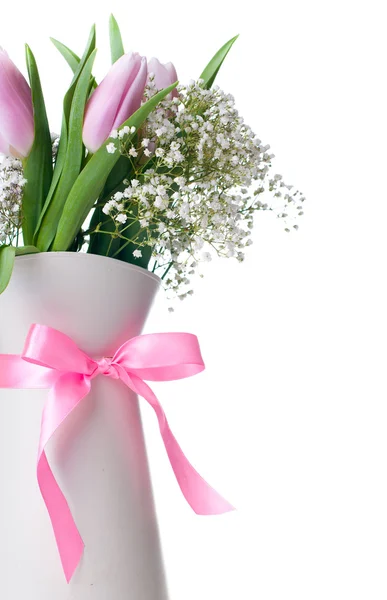 Pink tulips in a white jug with ribbon — Stock Photo, Image