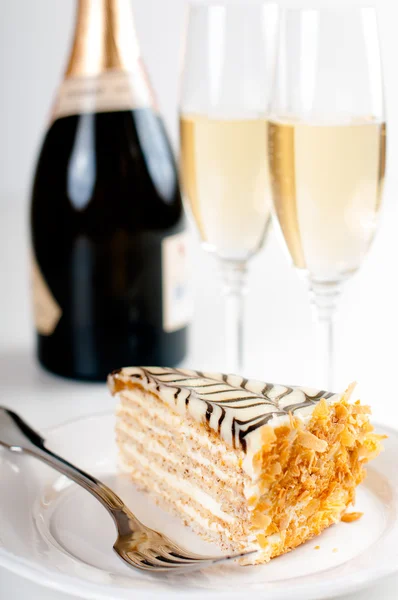Champagne in glasses and a dessert — Stock Photo, Image