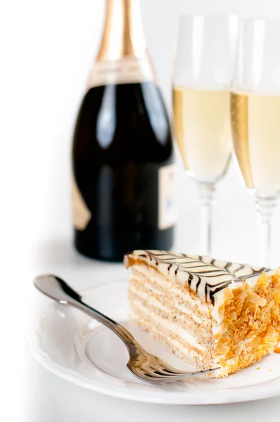 Champagne in glasses and a dessert — Stock Photo, Image