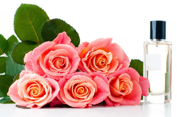 Perfume bottle and a bouquet — Stock Photo, Image