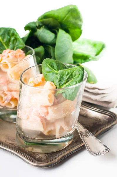 Pasta with salmon and spinach — Stock Photo, Image