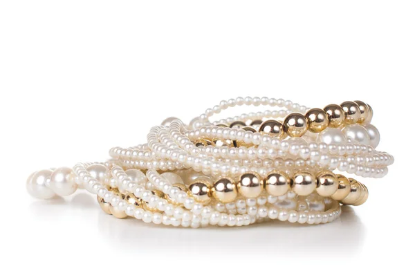 Jewelry made of gold and white pearls — Stock Photo, Image