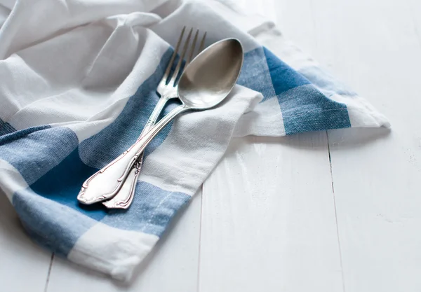 Cutlery and linen napkin — Stock Photo, Image