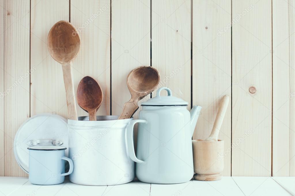 Coffee pot, enamel mugs and rustic spoons — Stock Photo © manera 50735541