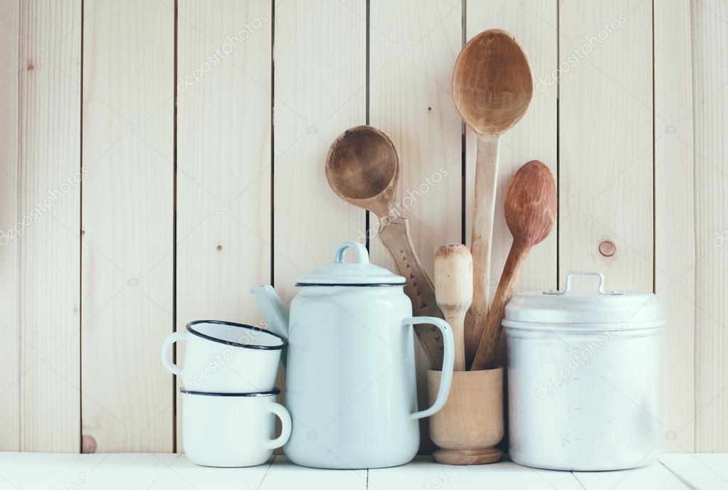 coffee pot, enamel mugs and rustic spoons 