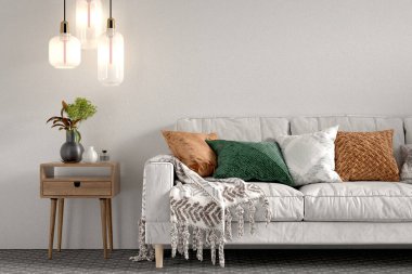 Kanepe, gün ışığı ve dekoratif eşyalarla dolu rahat bir ev.