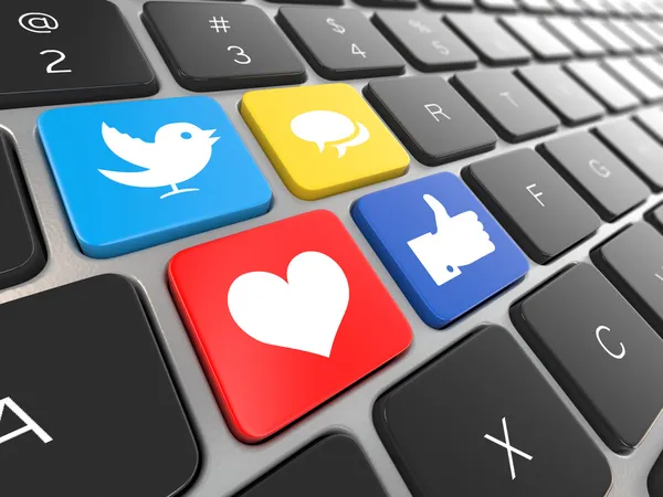 Social media on laptop keyboard. — Stock Photo, Image
