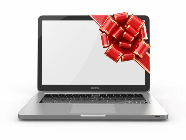 Laptop-Geschenk. Schleife und Schleife auf dem Bildschirm — Stockfoto