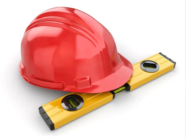 Construction concept. Hardhat and carpenter's level. — Stock Photo, Image