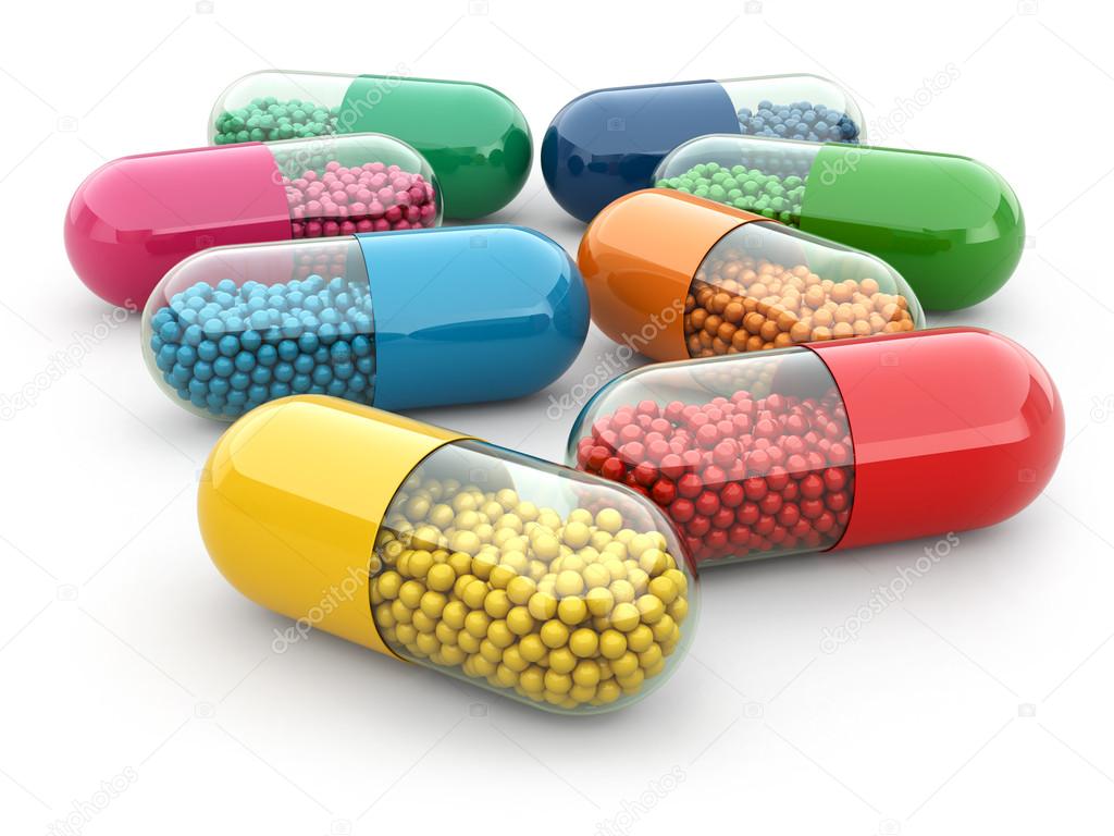 Pills and drugs on white isolated bacground. Medical concept.