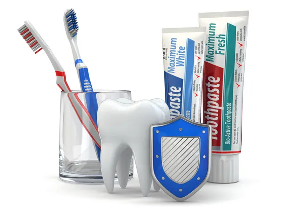 Protection dentaire, dents, bouclier, dentifrice et brosses à dents . — Photo