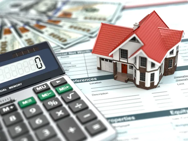 Rekenmachine voor hypotheken. huis, noney en document. Stockfoto