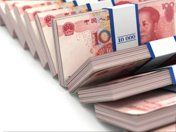 Una hilera de paquetes de yuanes. Mucho dinero en efectivo . —  Fotos de Stock