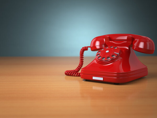 Vintage phone on green background. Hotline support concept.