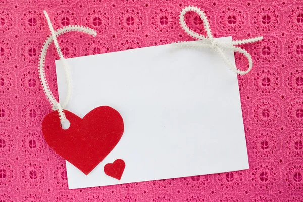 A blank white note card on pink background — Stock Photo, Image