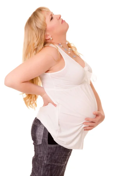 Pregnant woman suffers from back ache — Stock Photo, Image