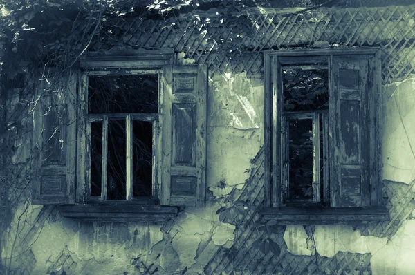 Old abandoned house windows — Stock Photo, Image