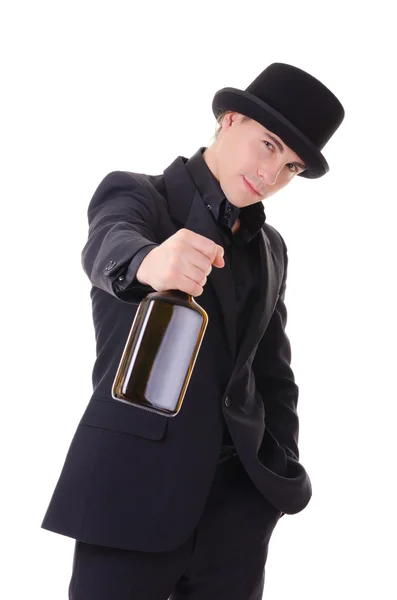 Hombre retro con estilo en traje negro con botella de bebida — Foto de Stock