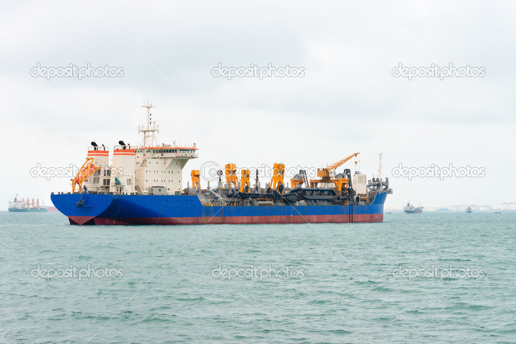 Big ship on the sea near a port