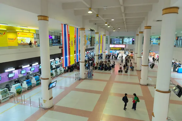 Check-in hall and desks in airport — Stock Photo, Image