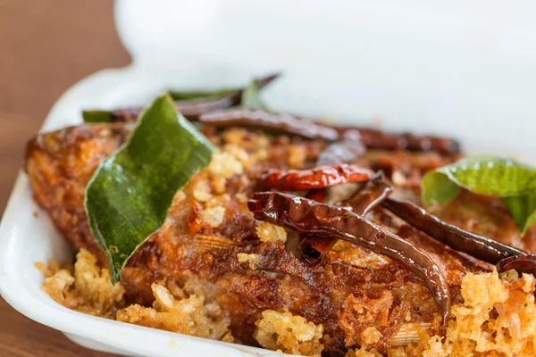 Fried fish with spicy hot red chili pepper — Stock Photo, Image