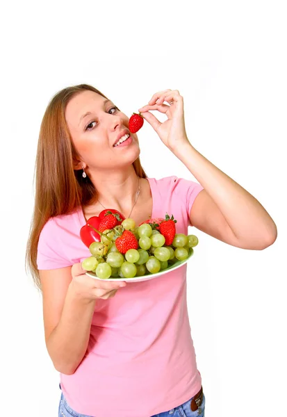 Jeune femme aux fruits et légumes — Photo