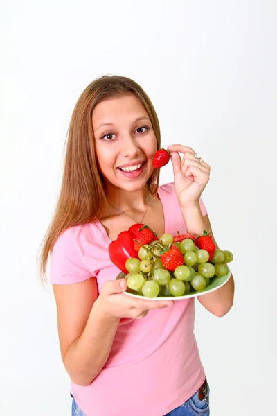 Mujer joven con frutas y verduras —  Fotos de Stock