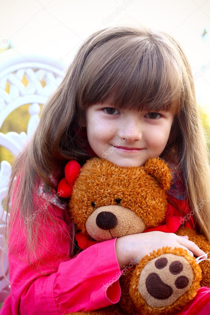 girl with a teddy bear