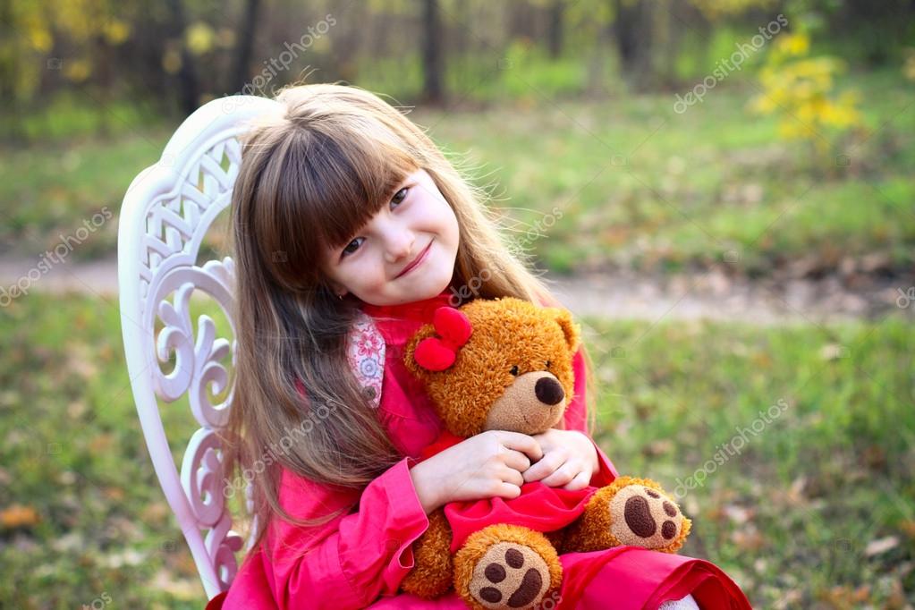 girl with a teddy