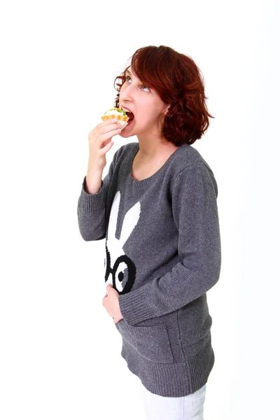 Dik meisje met cake — Stockfoto