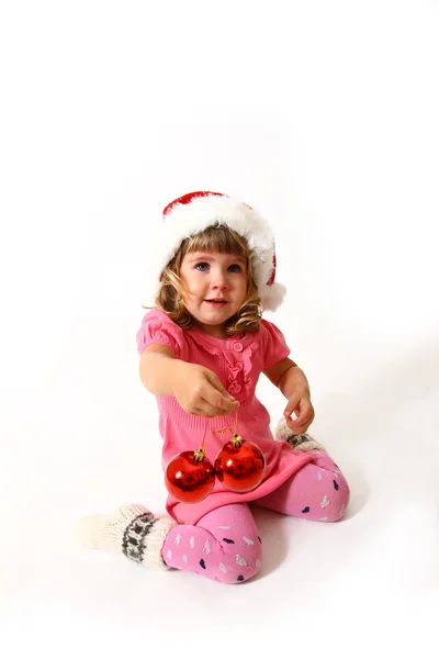 New Year or Christmas sweet baby in a pink dress isolated on whi — Stock Photo, Image