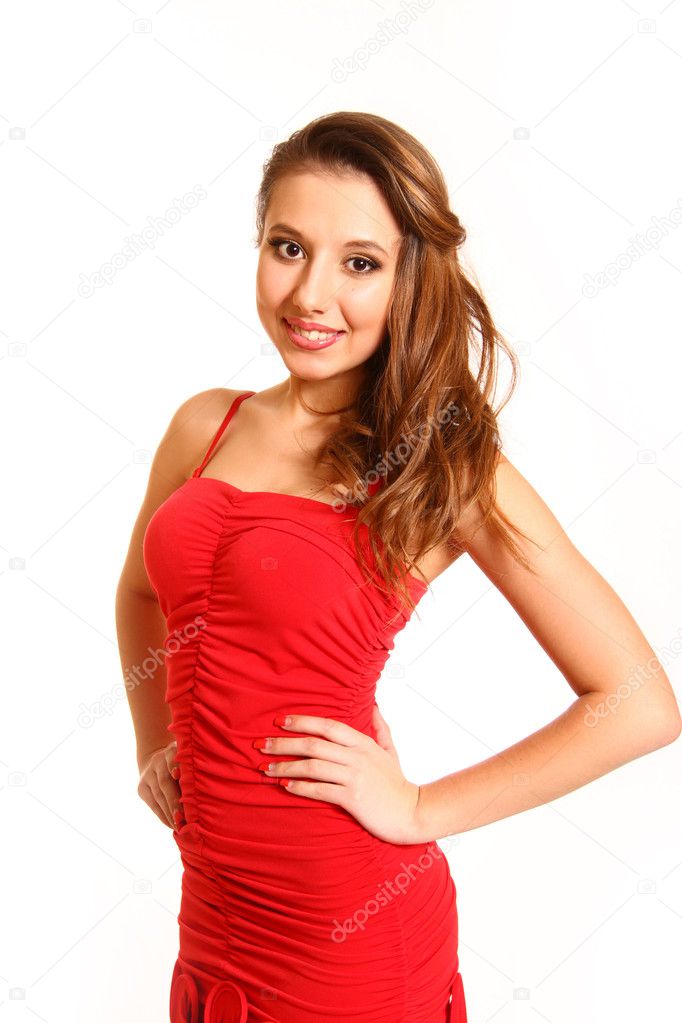 Beautiful girl in a red dress isolated on white background