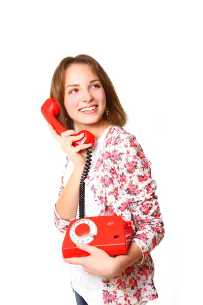 Mutlu kız beyaz ba izole kırmızı eski antika telefon ile — Stok fotoğraf