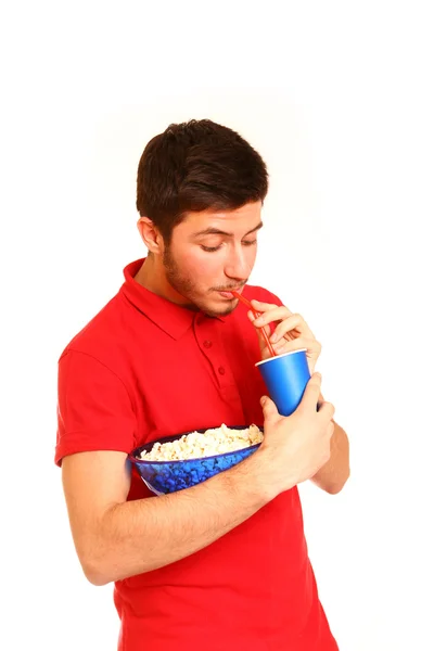 Menino segurando pipocas e bebendo isolado no fundo branco — Fotografia de Stock