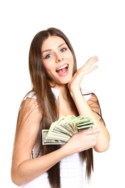 Happy young woman holding dollars on a white background — Stock Photo, Image