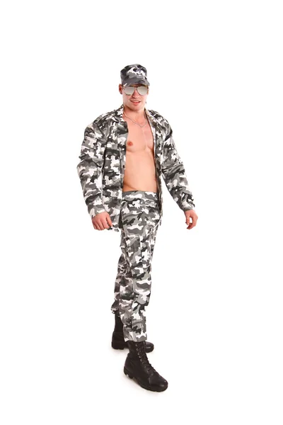 Sexy naked military man posing on a white background — Stock Photo, Image