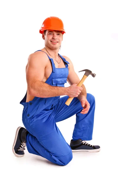 Porträt eines sexy Mechanikers mit Hammer — Stockfoto