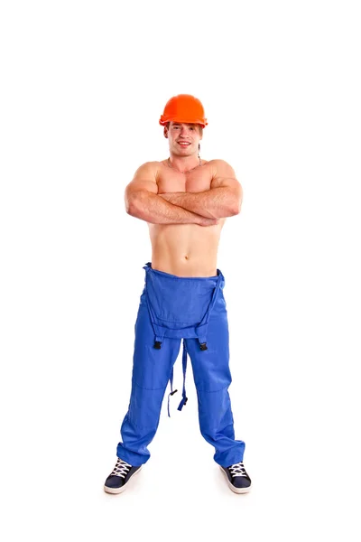 Sexy nude mechanic posing on a white background — Stock Photo, Image