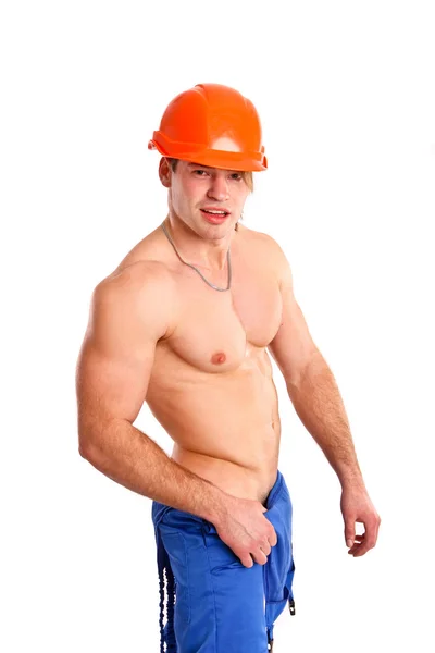 Sexy naakt mechanic poseren op een witte achtergrond — Stockfoto