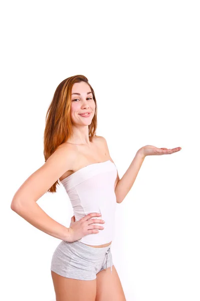 Lovely woman holding something imaginary against white backgroun — Stock Photo, Image