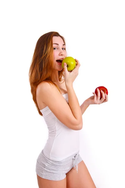 Joven, deportivo, en forma y hermosa chica con manzanas aisladas en wh — Foto de Stock
