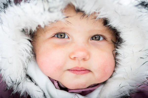 Happy baby on the winter background — Stock Photo, Image