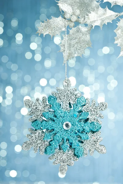 Branch of Christmas tree with decoration snowflake — Stock Photo, Image