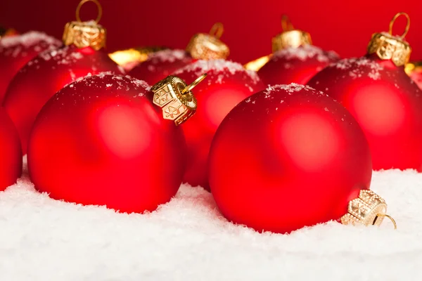 Christmas decoration balls with snow — Stock Photo, Image